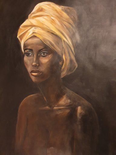 Africaine pensive avec turban jaune